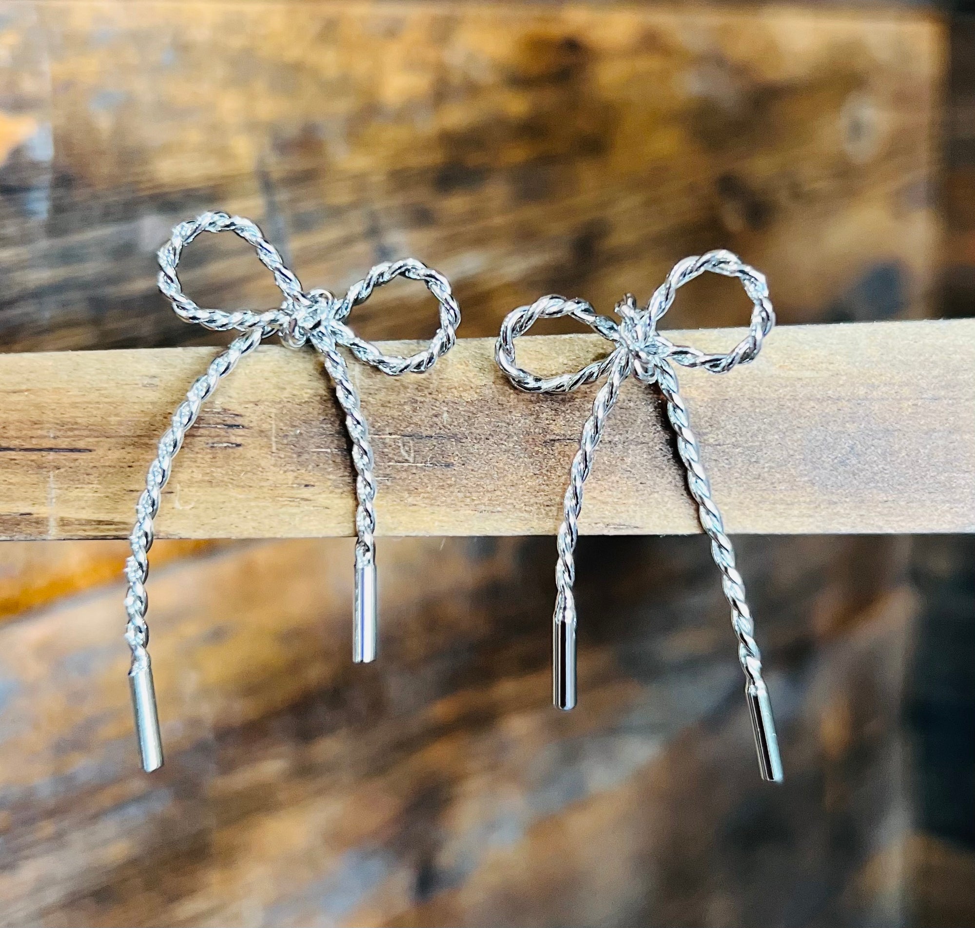 SILVER BOW EARRINGS