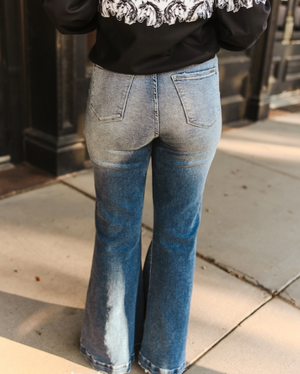 DARK WASH HIGH RISE TROUSER JEANS